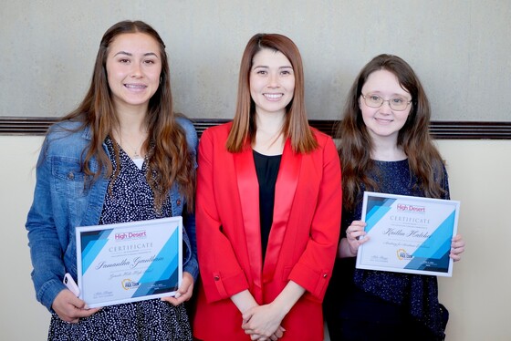 Scholorship recipients holding certificates