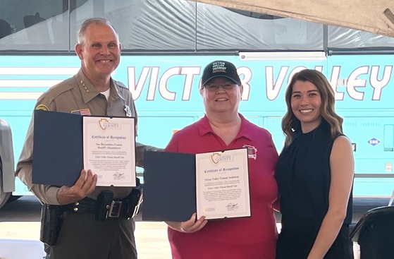 Kimberly Mesen with Sheriff Dicus and a representative from VVTA