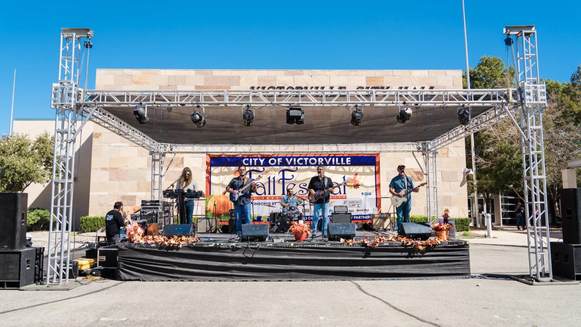 Photo of band playing on stage at Victorville Fall Festival