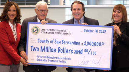 Photo of Paul Cook and Senator Wilk with $2 million check.