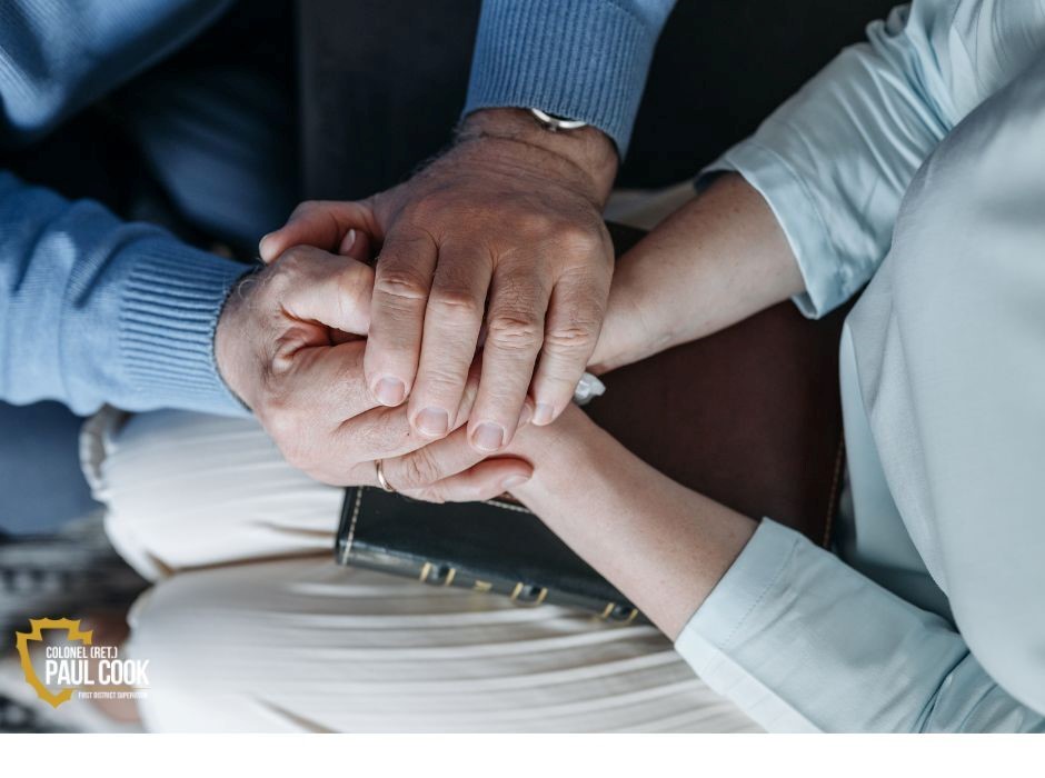 two people holding hands