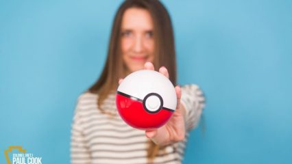 Woman holding pokemon ball