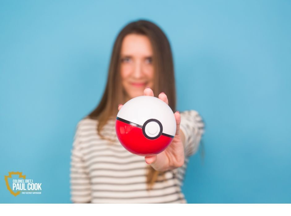 Woman holding pokemon ball