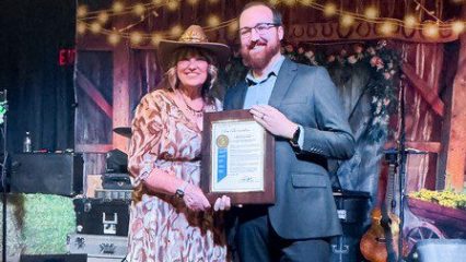 Our Constituent Services Director Samuel Shoup was honored to present Dr. Cox with a resolution.